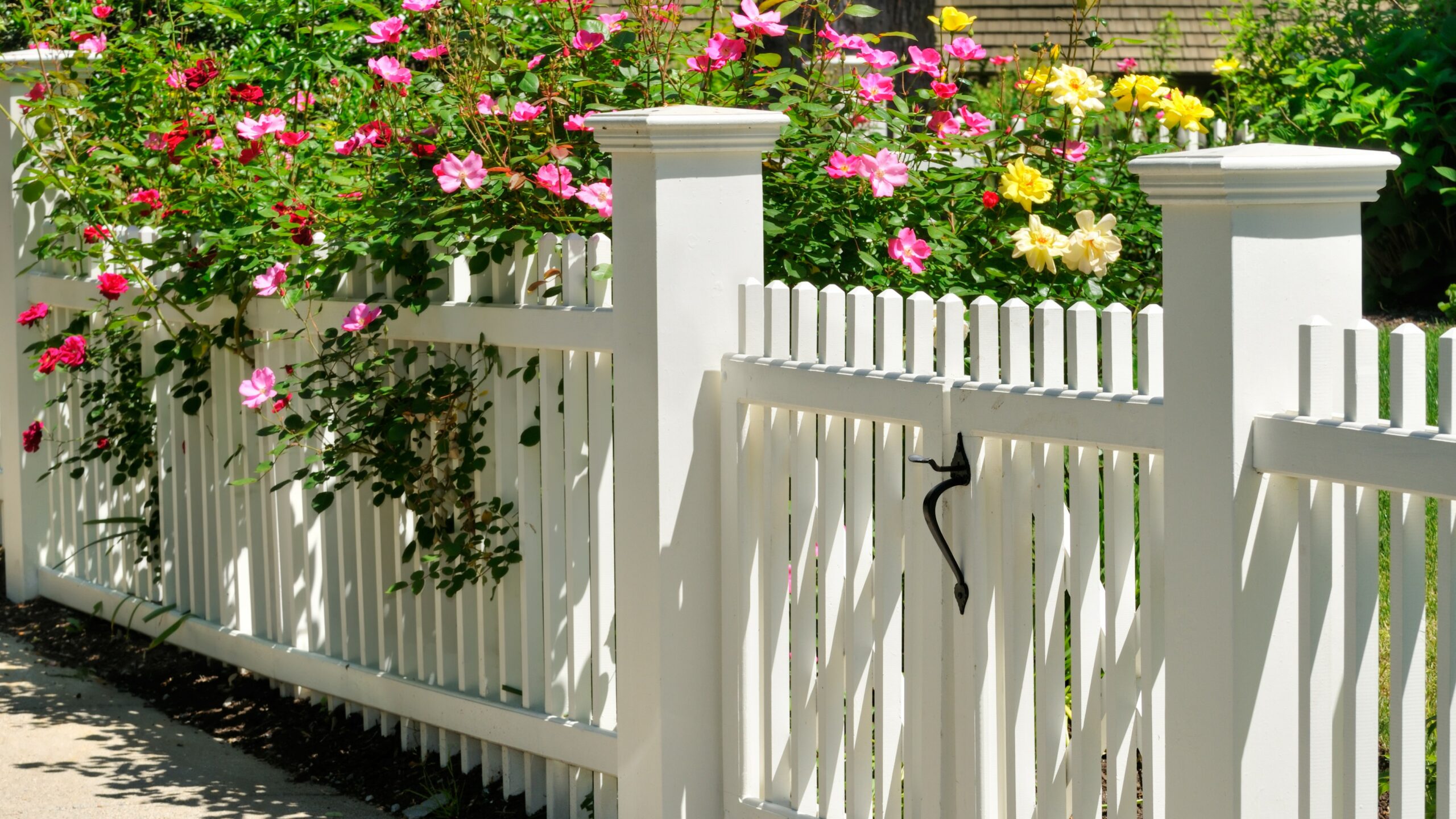 White fence with flowers
