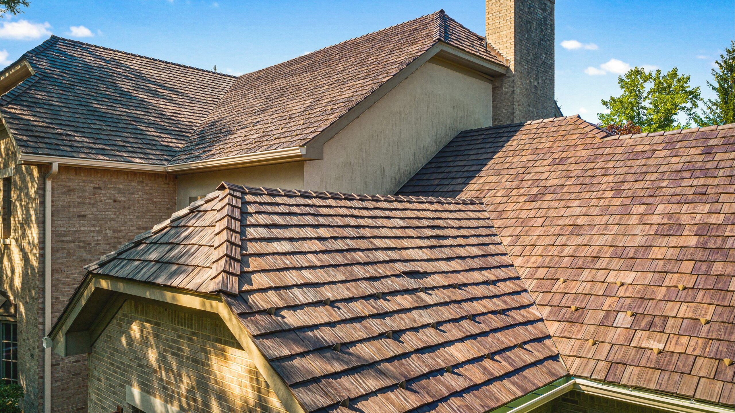 Residential roof with cedar shake tiles