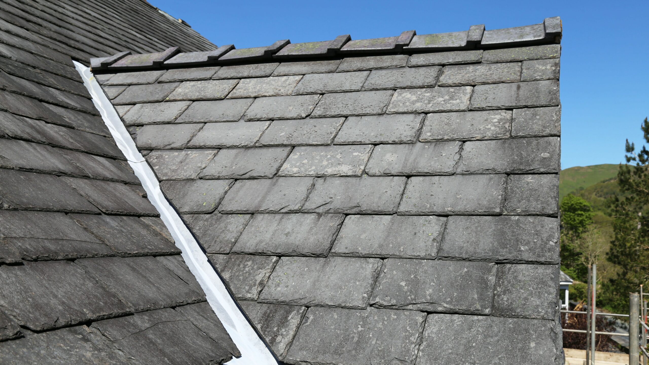 Residential roofing with slate tiles